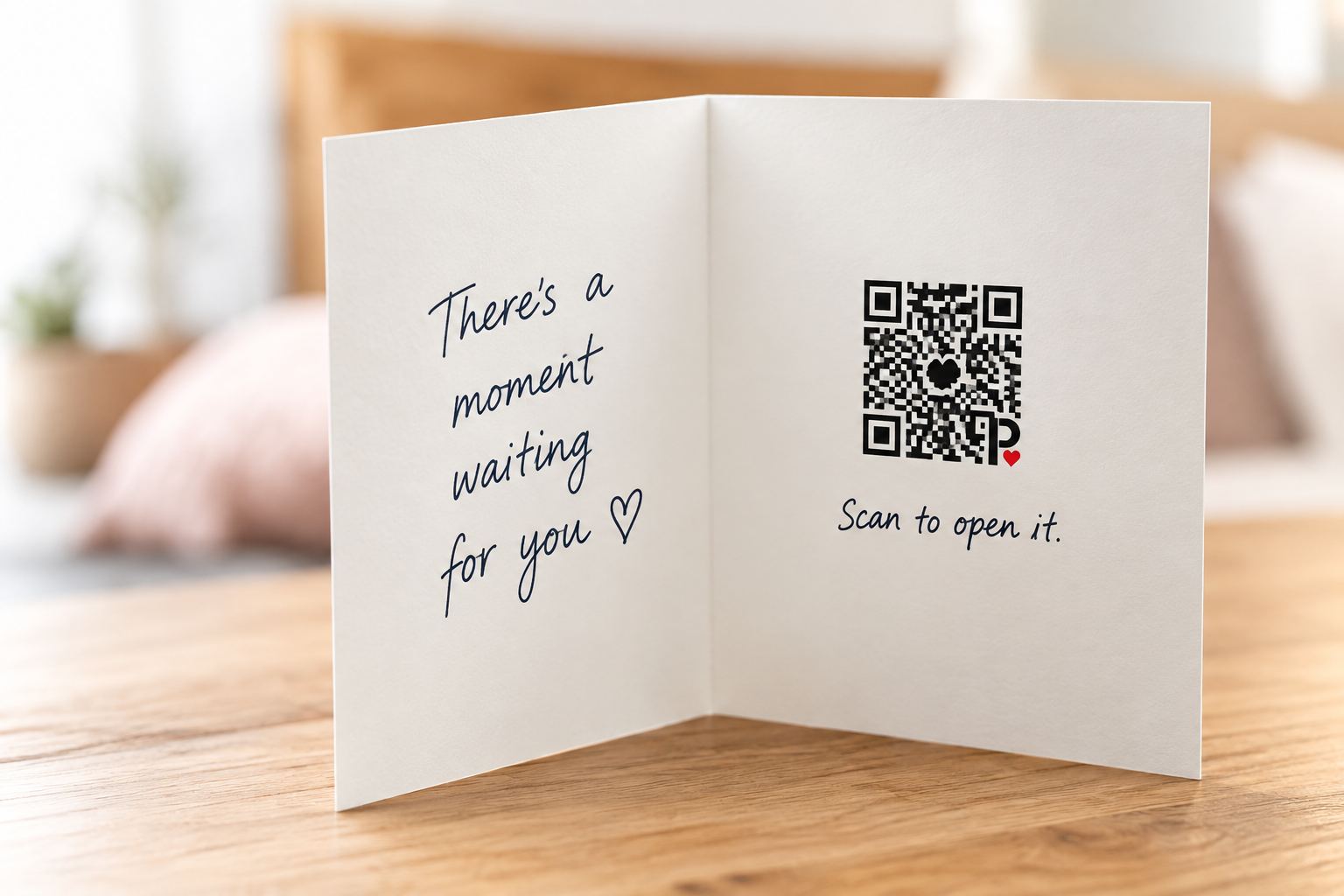 Open greeting card with a handwritten note and QR code